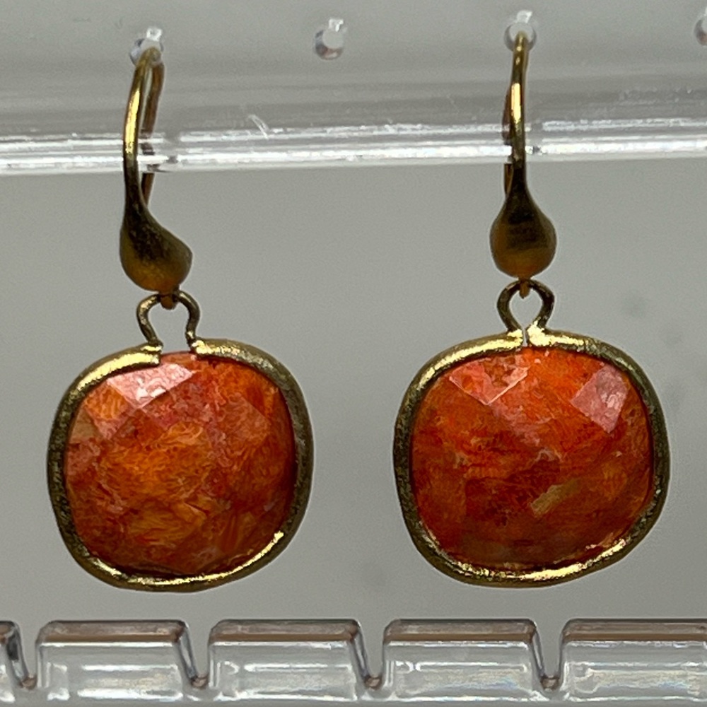 Gold earrings with orange stone